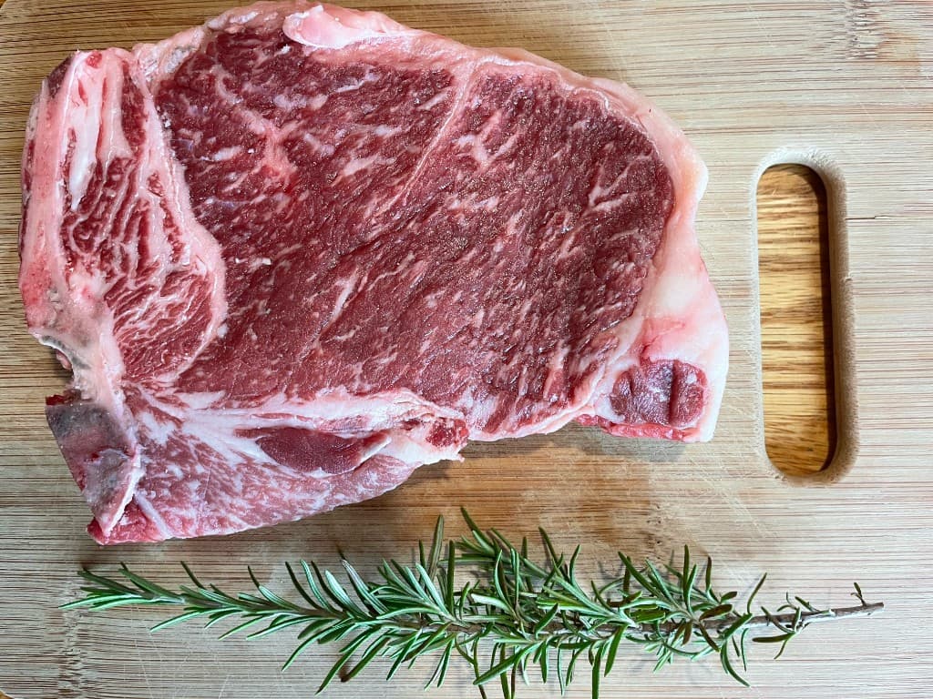 Bone-in fullblood Wagyu ribeye from the first harvest — marbling from the long grain finish